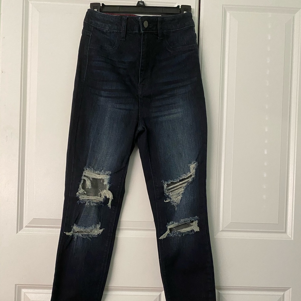 Dark wash high rise distressed skinny jeans
